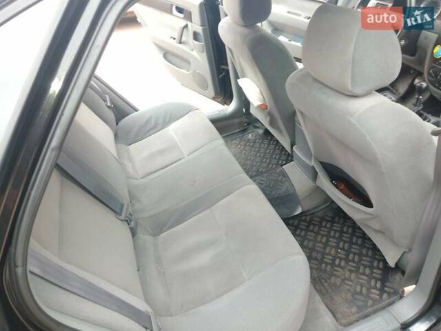 Чорний Деу Джентра, об'ємом двигуна 1.49 л та пробігом 112 тис. км за 4730 $, фото 10 на Automoto.ua