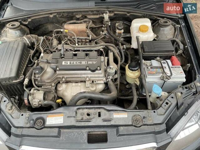 Черный Дэу Джентра, объемом двигателя 1.49 л и пробегом 82 тыс. км за 6000 $, фото 10 на Automoto.ua