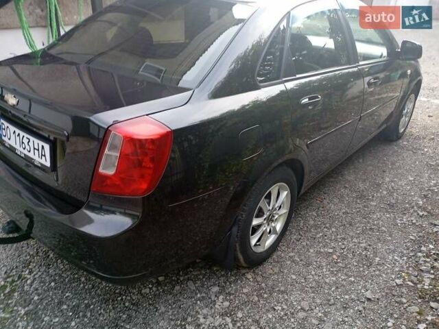 Черный Дэу Джентра, объемом двигателя 1.5 л и пробегом 88 тыс. км за 5500 $, фото 1 на Automoto.ua