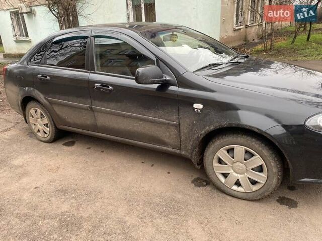 Черный Дэу Джентра, объемом двигателя 1.49 л и пробегом 82 тыс. км за 6000 $, фото 4 на Automoto.ua