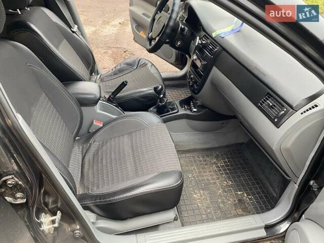 Черный Дэу Джентра, объемом двигателя 1.49 л и пробегом 82 тыс. км за 6000 $, фото 8 на Automoto.ua