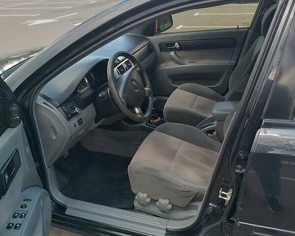 Чорний Деу Джентра, об'ємом двигуна 1.49 л та пробігом 290 тис. км за 7770 $, фото 7 на Automoto.ua
