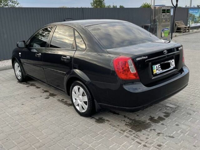 Черный Дэу Джентра, объемом двигателя 1.6 л и пробегом 147 тыс. км за 3500 $, фото 3 на Automoto.ua