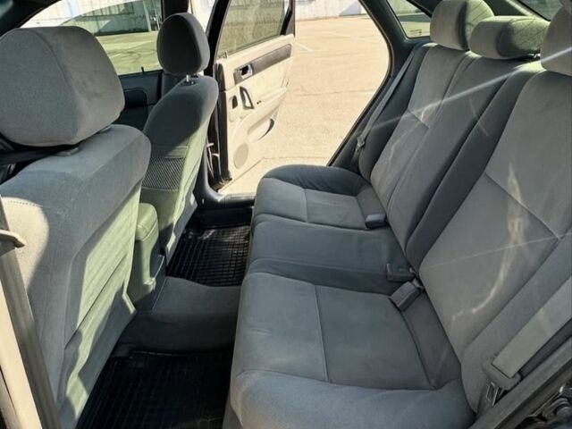 Черный Дэу Джентра, объемом двигателя 1.6 л и пробегом 147 тыс. км за 3500 $, фото 11 на Automoto.ua