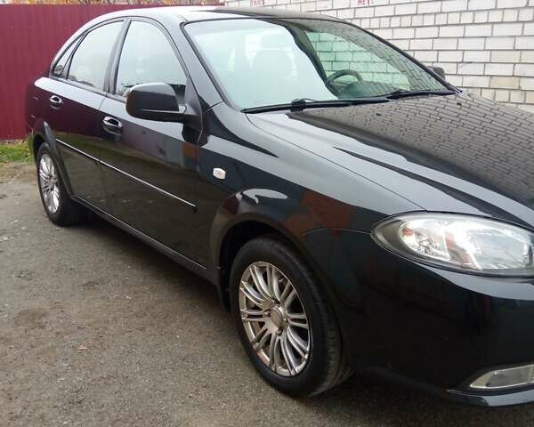 Черный Дэу Джентра, объемом двигателя 1.49 л и пробегом 122 тыс. км за 6750 $, фото 1 на Automoto.ua