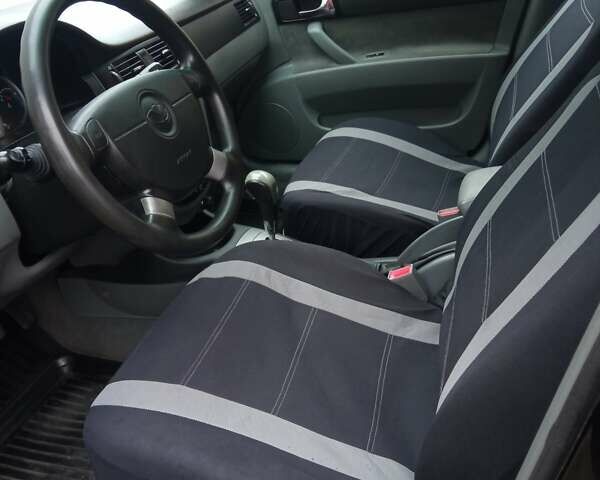 Черный Дэу Джентра, объемом двигателя 1.49 л и пробегом 122 тыс. км за 6750 $, фото 5 на Automoto.ua