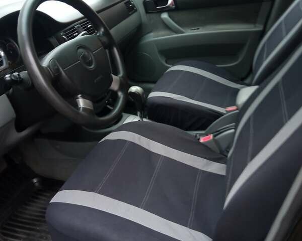 Черный Дэу Джентра, объемом двигателя 1.49 л и пробегом 122 тыс. км за 6750 $, фото 4 на Automoto.ua