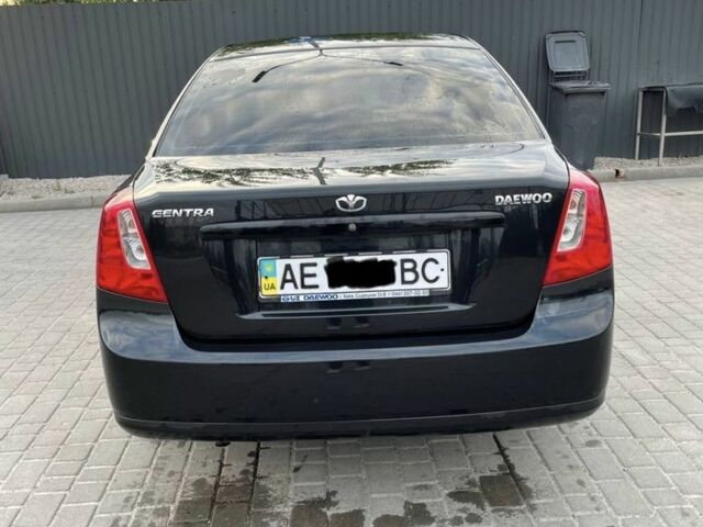 Черный Дэу Джентра, объемом двигателя 1.6 л и пробегом 147 тыс. км за 3500 $, фото 2 на Automoto.ua