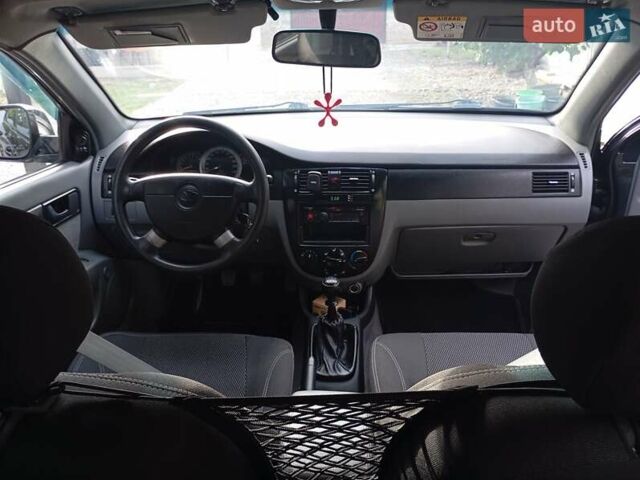 Чорний Деу Джентра, об'ємом двигуна 1.5 л та пробігом 88 тис. км за 5559 $, фото 14 на Automoto.ua