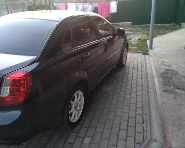 Чорний Деу Джентра, об'ємом двигуна 1.49 л та пробігом 218 тис. км за 5000 $, фото 4 на Automoto.ua