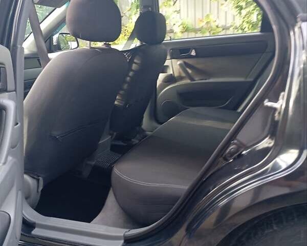 Чорний Деу Джентра, об'ємом двигуна 1.5 л та пробігом 88 тис. км за 5559 $, фото 6 на Automoto.ua