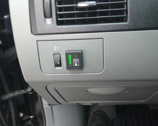 Черный Дэу Джентра, объемом двигателя 1.49 л и пробегом 122 тыс. км за 6750 $, фото 9 на Automoto.ua