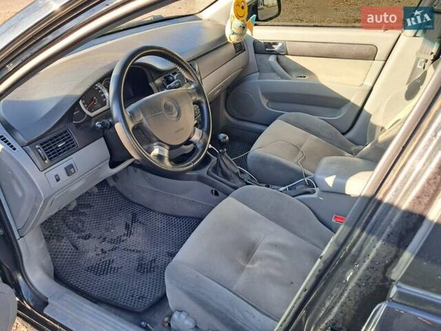 Черный Дэу Джентра, объемом двигателя 1.49 л и пробегом 203 тыс. км за 4700 $, фото 6 на Automoto.ua