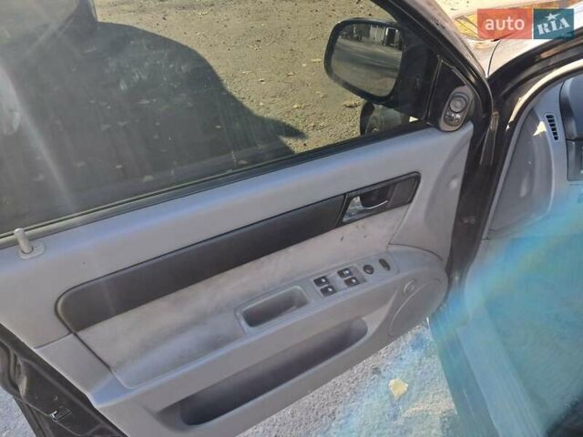 Черный Дэу Джентра, объемом двигателя 1.49 л и пробегом 203 тыс. км за 4700 $, фото 2 на Automoto.ua