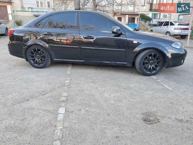 Черный Дэу Джентра, объемом двигателя 1.49 л и пробегом 203 тыс. км за 4700 $, фото 4 на Automoto.ua