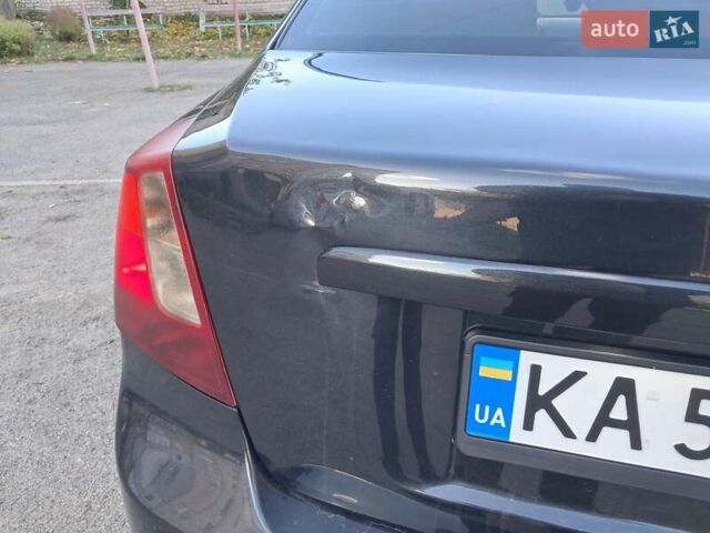 Черный Дэу Джентра, объемом двигателя 1.49 л и пробегом 203 тыс. км за 4700 $, фото 5 на Automoto.ua