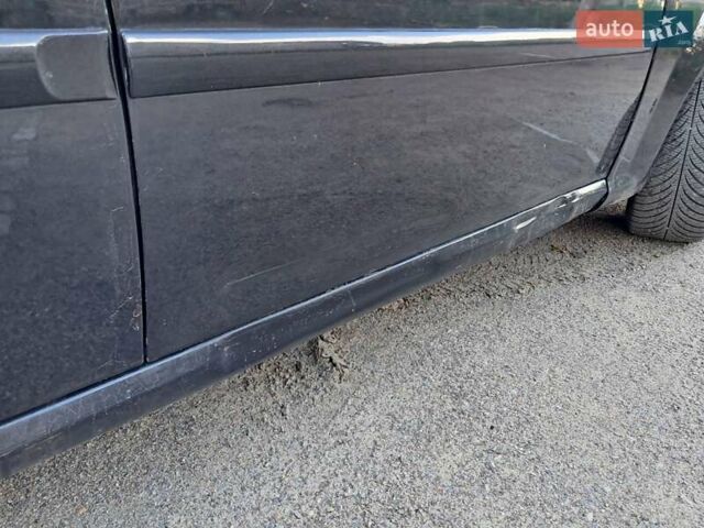 Черный Дэу Джентра, объемом двигателя 1.49 л и пробегом 203 тыс. км за 4700 $, фото 7 на Automoto.ua