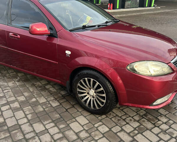 Червоний Деу Джентра, об'ємом двигуна 1.49 л та пробігом 192 тис. км за 6700 $, фото 18 на Automoto.ua