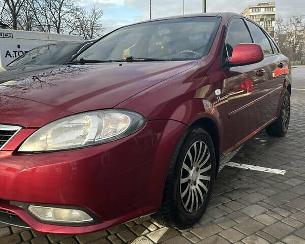 Червоний Деу Джентра, об'ємом двигуна 1.49 л та пробігом 192 тис. км за 6700 $, фото 20 на Automoto.ua