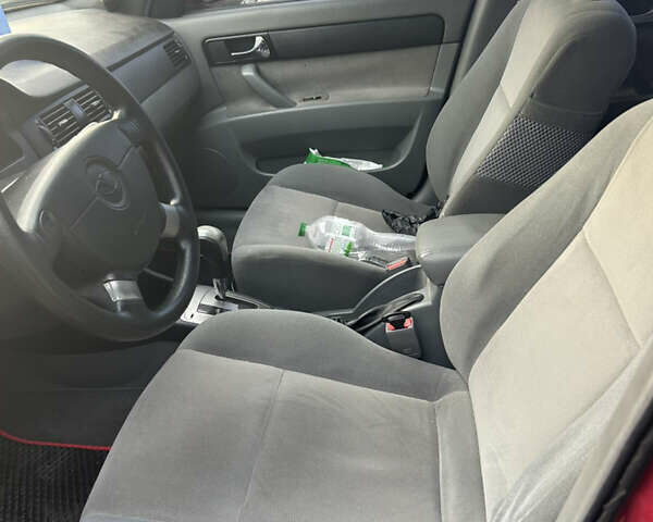 Червоний Деу Джентра, об'ємом двигуна 1.49 л та пробігом 192 тис. км за 6700 $, фото 6 на Automoto.ua