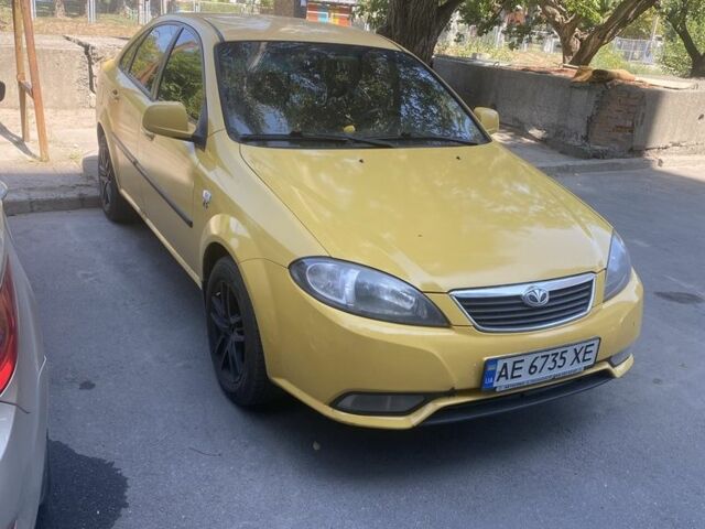 Желтый Дэу Джентра, объемом двигателя 1.5 л и пробегом 320 тыс. км за 2900 $, фото 6 на Automoto.ua