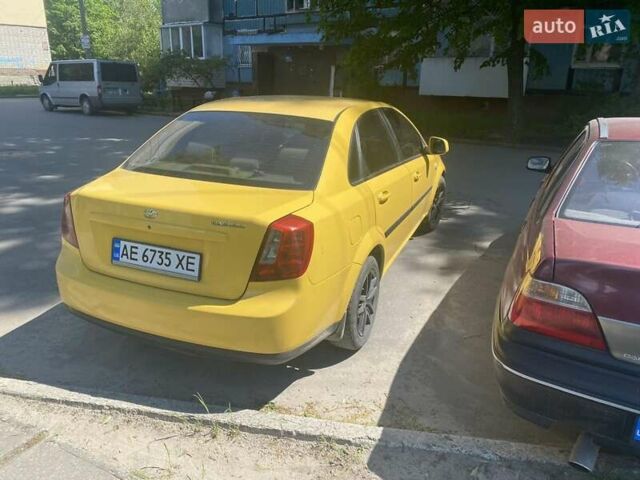 Желтый Дэу Джентра, объемом двигателя 1.5 л и пробегом 300 тыс. км за 2700 $, фото 2 на Automoto.ua