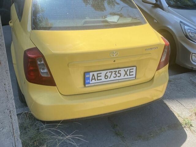 Желтый Дэу Джентра, объемом двигателя 1.5 л и пробегом 320 тыс. км за 2900 $, фото 4 на Automoto.ua