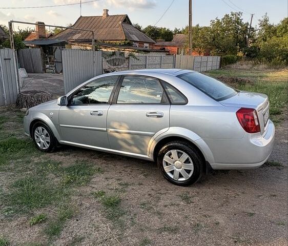 Серый Дэу Джентра, объемом двигателя 1.5 л и пробегом 147 тыс. км за 5600 $, фото 2 на Automoto.ua