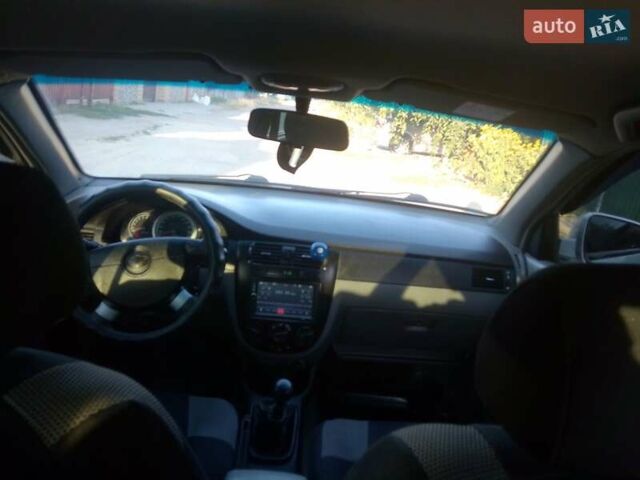 Сірий Деу Джентра, об'ємом двигуна 1.49 л та пробігом 255 тис. км за 4200 $, фото 12 на Automoto.ua