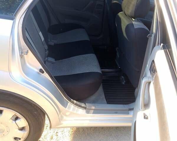 Сірий Деу Джентра, об'ємом двигуна 1.49 л та пробігом 255 тис. км за 4200 $, фото 10 на Automoto.ua