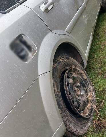 Серый Дэу Джентра, объемом двигателя 1.5 л и пробегом 194 тыс. км за 1800 $, фото 2 на Automoto.ua