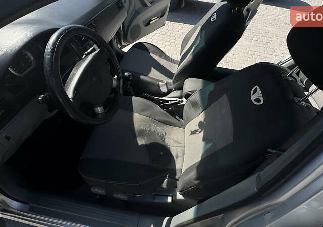 Сірий Деу Джентра, об'ємом двигуна 1.49 л та пробігом 263 тис. км за 4450 $, фото 15 на Automoto.ua