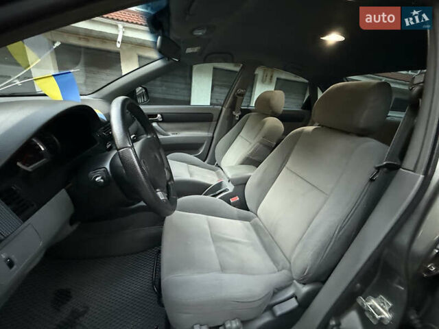 Сірий Деу Джентра, об'ємом двигуна 1.5 л та пробігом 164 тис. км за 5300 $, фото 8 на Automoto.ua