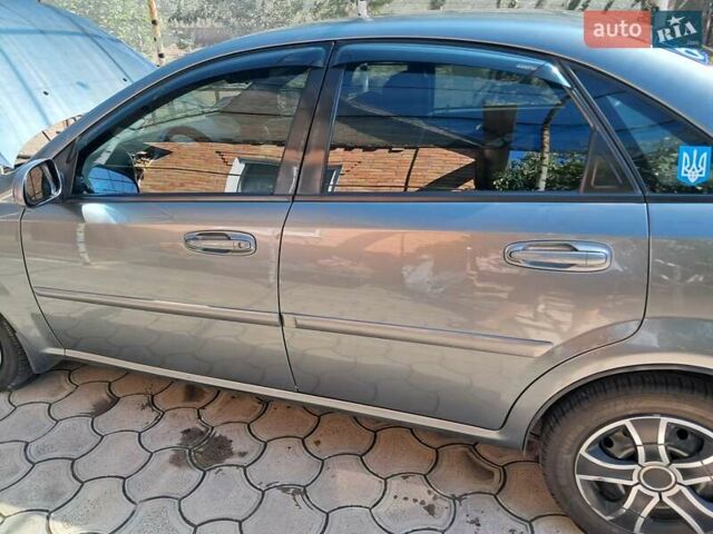 Серый Дэу Джентра, объемом двигателя 1.49 л и пробегом 49 тыс. км за 5999 $, фото 5 на Automoto.ua