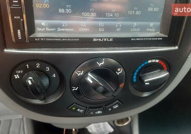 Серый Дэу Джентра, объемом двигателя 1.49 л и пробегом 89 тыс. км за 7100 $, фото 11 на Automoto.ua