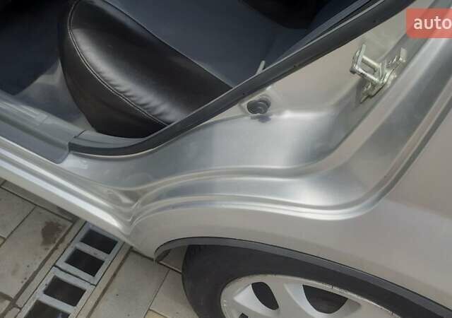 Серый Дэу Джентра, объемом двигателя 1.49 л и пробегом 89 тыс. км за 7100 $, фото 16 на Automoto.ua