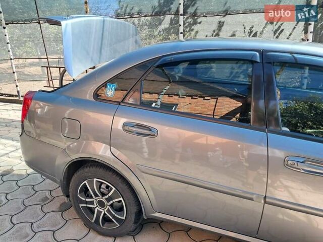 Серый Дэу Джентра, объемом двигателя 1.49 л и пробегом 49 тыс. км за 5999 $, фото 4 на Automoto.ua