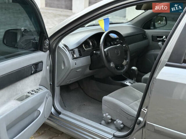 Сірий Деу Джентра, об'ємом двигуна 1.5 л та пробігом 164 тис. км за 5300 $, фото 9 на Automoto.ua