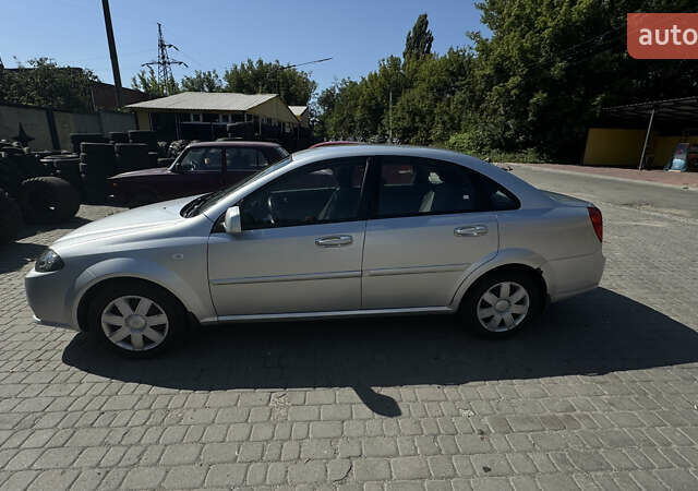 Сірий Деу Джентра, об'ємом двигуна 1.49 л та пробігом 263 тис. км за 4450 $, фото 2 на Automoto.ua