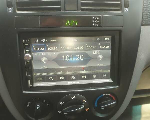 Сірий Деу Джентра, об'ємом двигуна 1.49 л та пробігом 135 тис. км за 5250 $, фото 18 на Automoto.ua