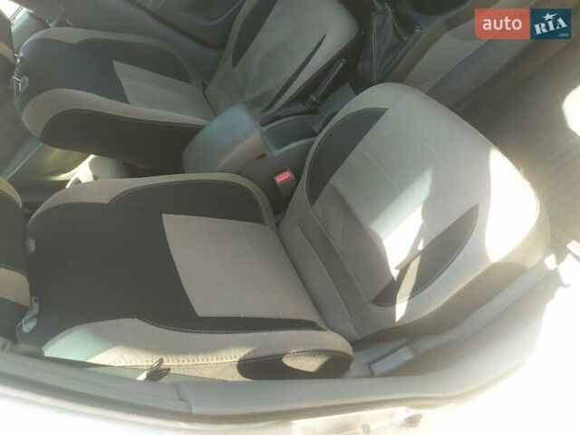 Сірий Деу Джентра, об'ємом двигуна 1.49 л та пробігом 135 тис. км за 5250 $, фото 31 на Automoto.ua