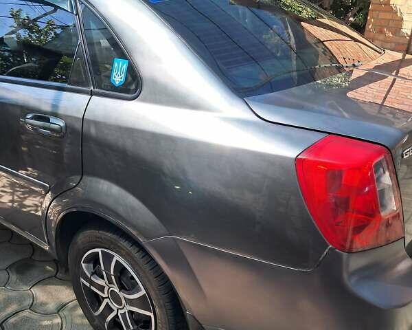 Серый Дэу Джентра, объемом двигателя 1.49 л и пробегом 49 тыс. км за 5999 $, фото 8 на Automoto.ua