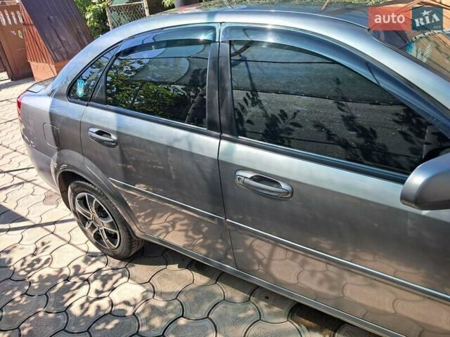 Серый Дэу Джентра, объемом двигателя 1.49 л и пробегом 49 тыс. км за 5999 $, фото 3 на Automoto.ua