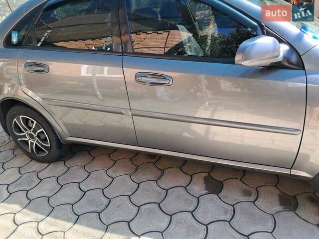 Серый Дэу Джентра, объемом двигателя 1.49 л и пробегом 49 тыс. км за 5999 $, фото 2 на Automoto.ua