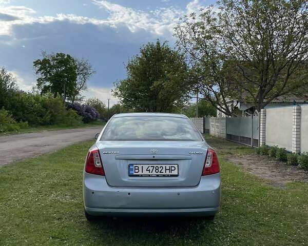 Сірий Деу Джентра, об'ємом двигуна 1.49 л та пробігом 180 тис. км за 3800 $, фото 11 на Automoto.ua