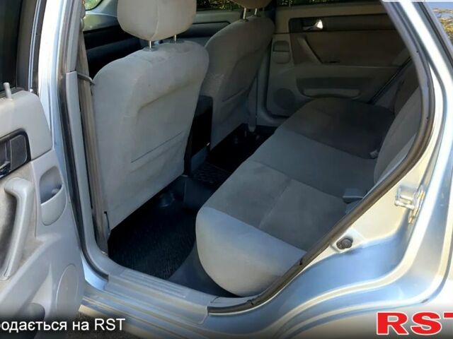 Синий Дэу Джентра, объемом двигателя 15 л и пробегом 170 тыс. км за 5200 $, фото 6 на Automoto.ua