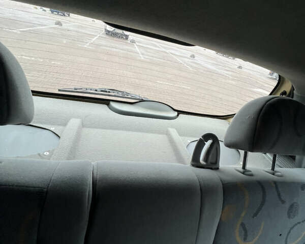 Жовтий Деу Калос, об'ємом двигуна 1.2 л та пробігом 157 тис. км за 2700 $, фото 13 на Automoto.ua