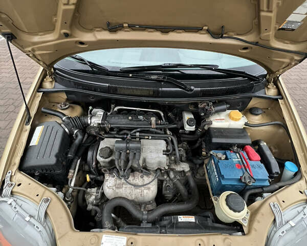 Жовтий Деу Калос, об'ємом двигуна 1.2 л та пробігом 157 тис. км за 2700 $, фото 2 на Automoto.ua