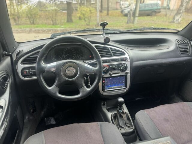 Серый Дэу Калос, объемом двигателя 1.6 л и пробегом 66 тыс. км за 1650 $, фото 6 на Automoto.ua