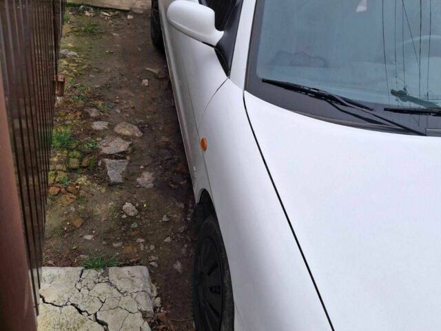 Белый Дэу Лачетти, объемом двигателя 1.6 л и пробегом 171 тыс. км за 2500 $, фото 4 на Automoto.ua